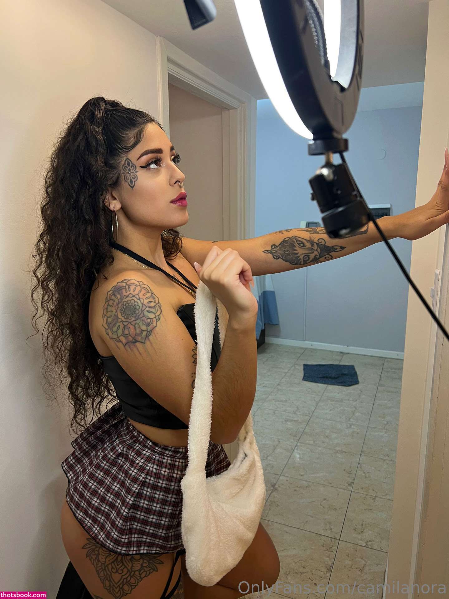 Camila Nora Photo #13