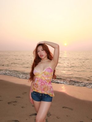 Angela Muji Photo #8